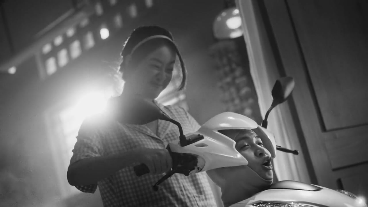 Black and white frame from a Grab campaign shot on location in Vietnam by Hoang Films